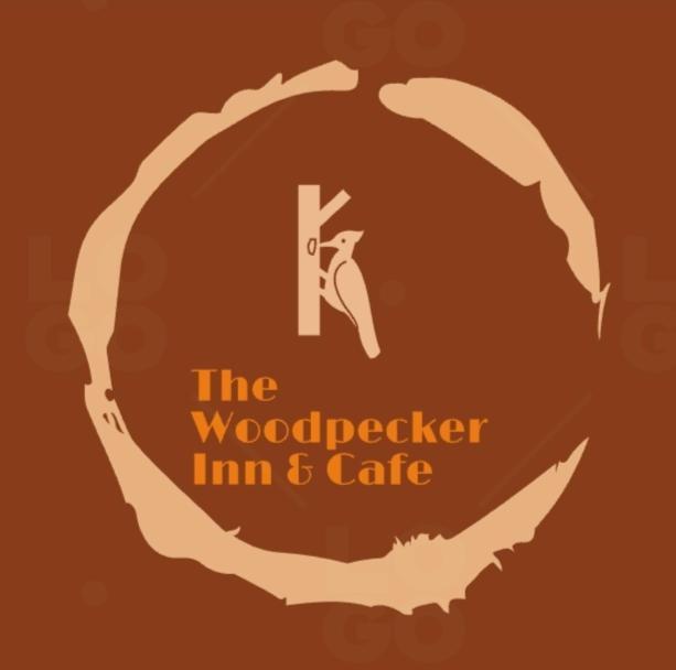 The Woodpecker Inn & Cafe, Jibhi Exterior photo